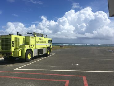 Image of Taddy Bay Airport with emergency vehicle parked on the tarmac